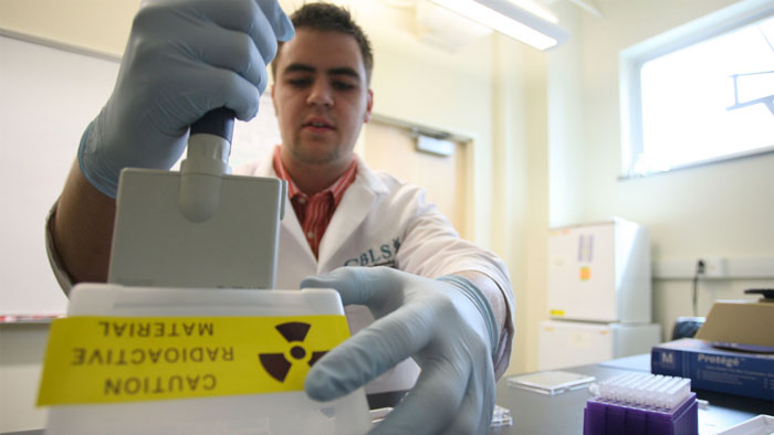 Student participating in a science lab.