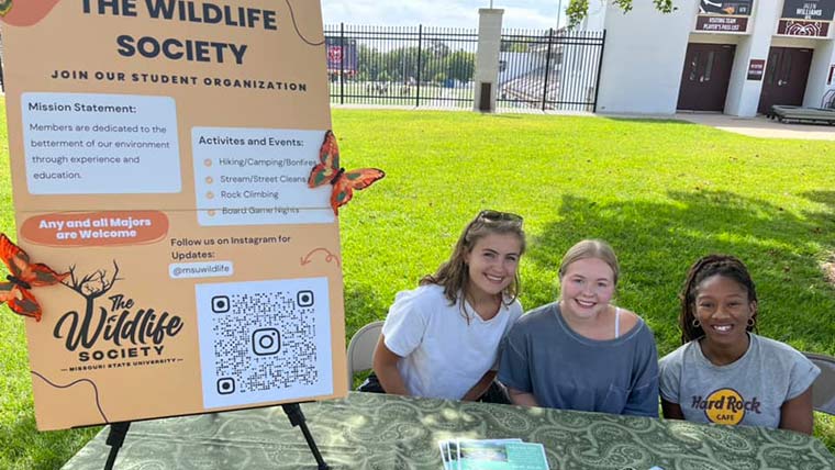 Wildlife Society members at an informational event on campus.